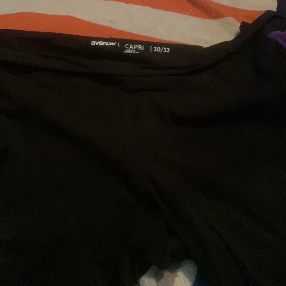 Black and purple exercising pants